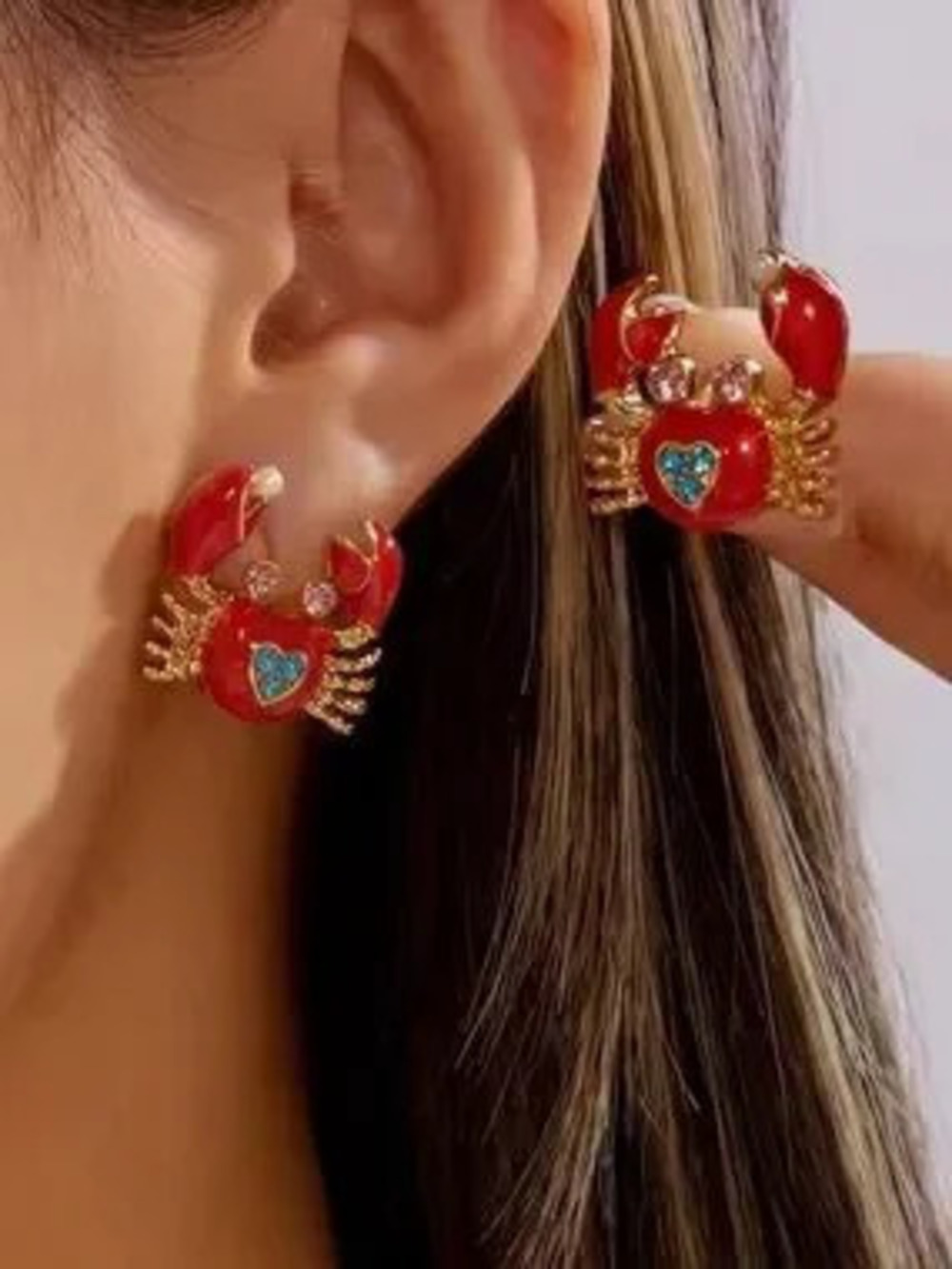 Gold-Tone Red Crab Stud Earrings with Blue Heart Accent